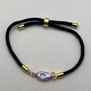 Handmade bracelet with a pearl centre